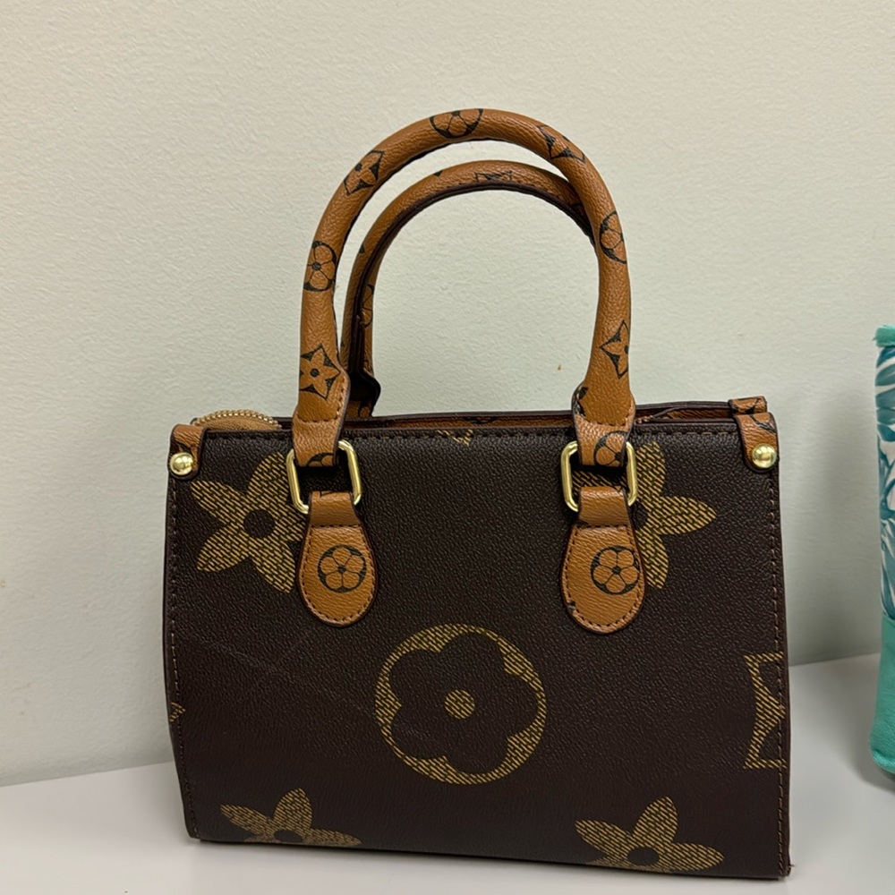 Brown, small, Fashion bag , Brand New with cross body strap.